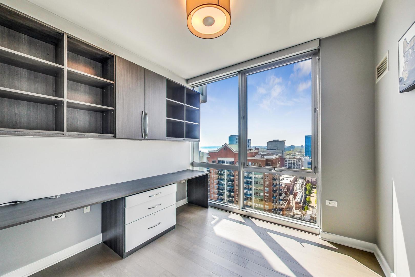 Undisclosed Address Chicago, IL 60616 - Photo 23 of 31 a room with furniture and a window