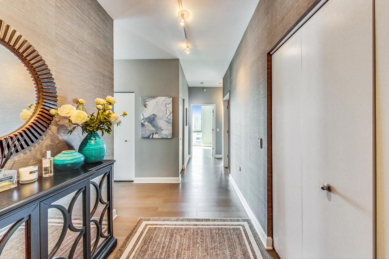 Undisclosed Address Chicago, IL 60616 - Photo 4 of 31 a view of a hallway view with wooden floor