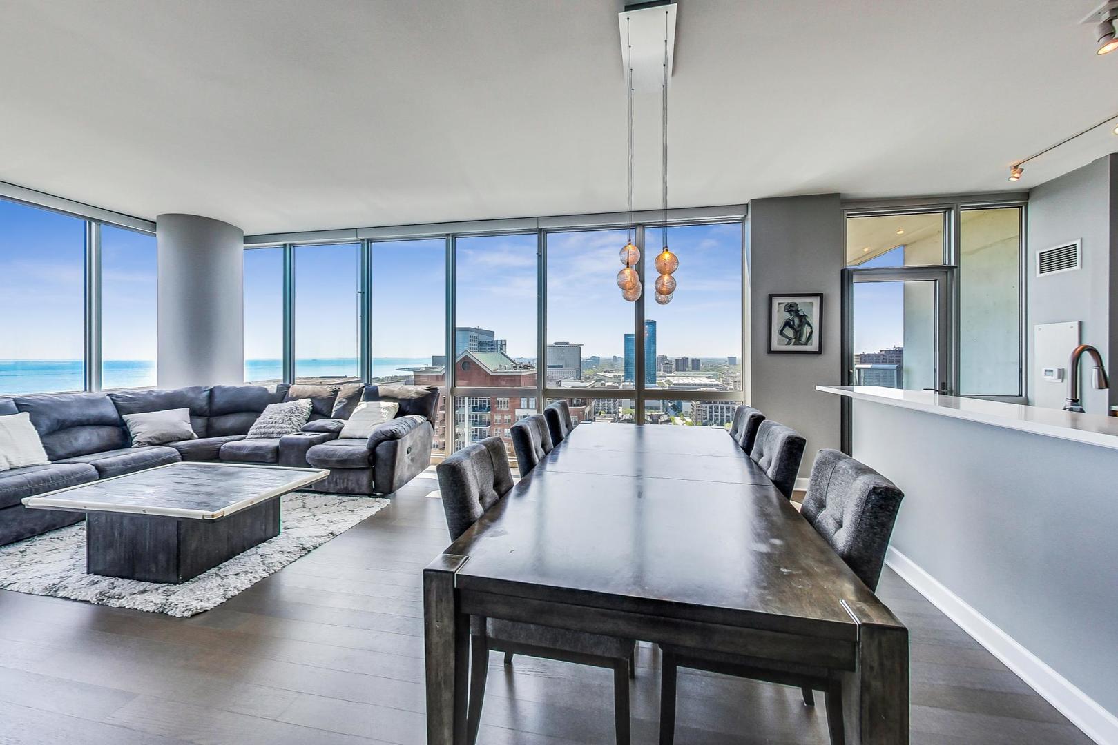 Undisclosed Address Chicago, IL 60616 - Photo 9 of 31 a view of a dining room with furniture window and wooden floor