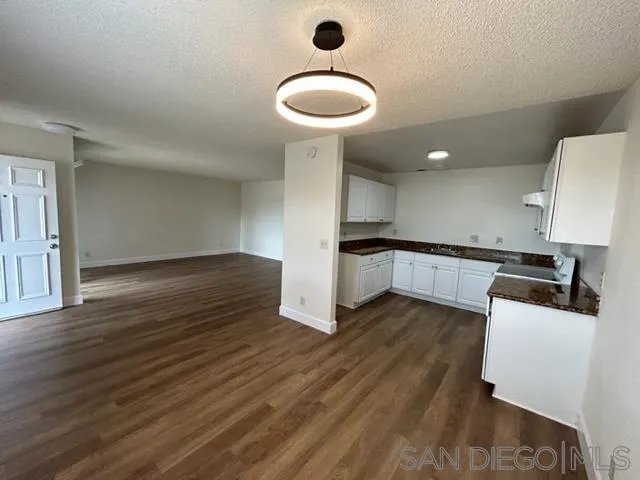 1604 Montecito Road, Unit 10 Ramona, CA 92065 - Photo 13 of 45 a kitchen with wooden floor and a sink