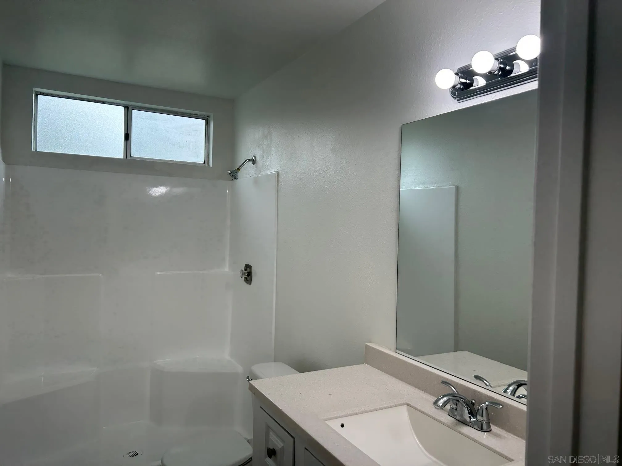 1604 Montecito Road, Unit 10 Ramona, CA 92065 - Photo 38 of 45 a bathroom with a sink a toilet and shower