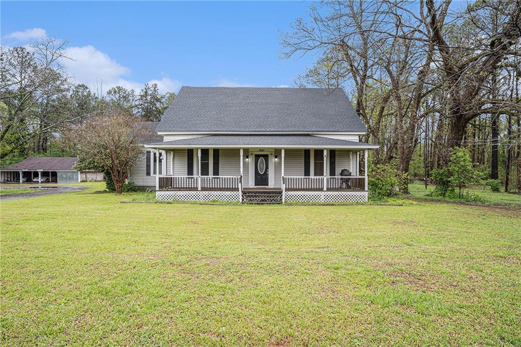 front view of a house with a yard