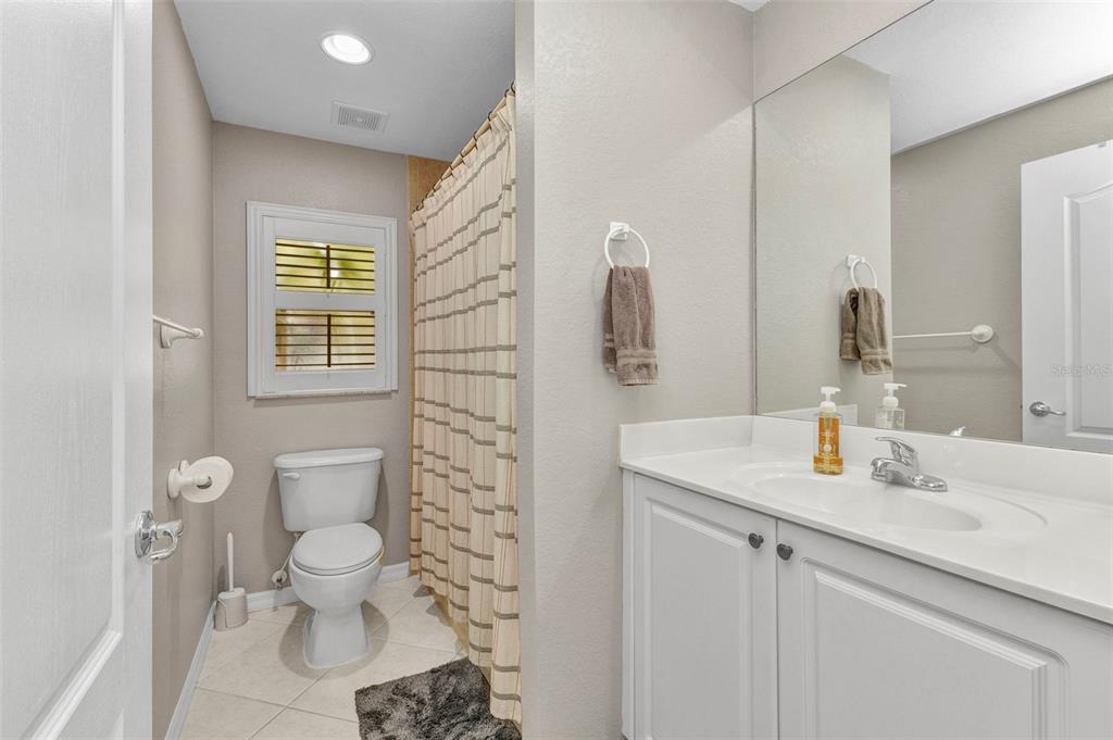 3715 Albacete Circle, Unit 93 Punta Gorda, FL 33950 - Photo 23 of 32 a bathroom with a sink toilet and shower