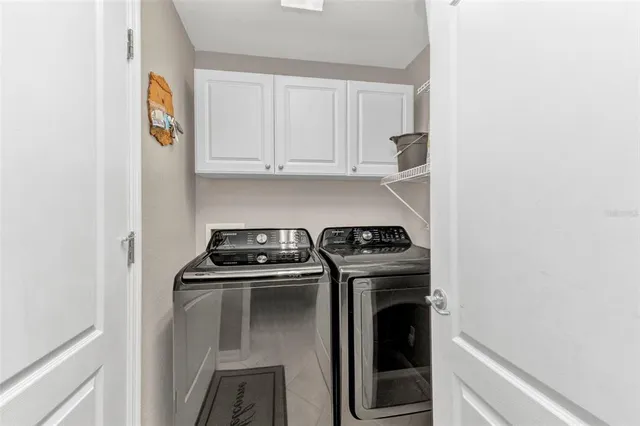 a kitchen with a stove and a refrigerator