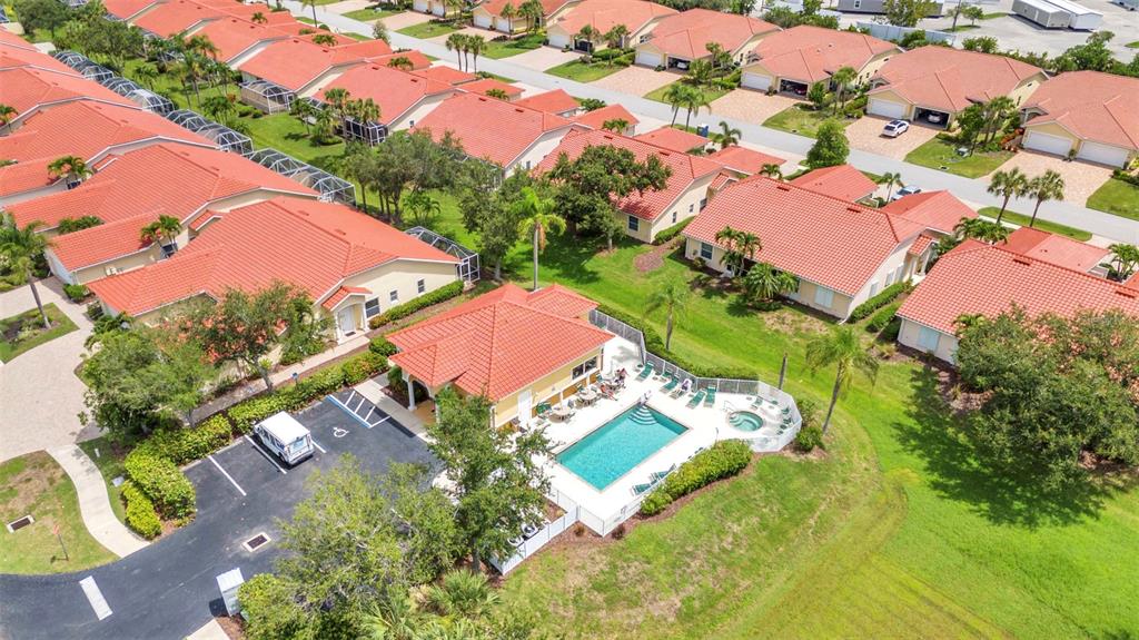 3715 Albacete Circle, Unit 93 Punta Gorda, FL 33950 - Photo 32 of 32 an aerial view of a house with yard swimming pool and outdoor seating