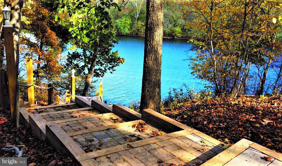 Lot #2 Shepherds Cove Shepherdstown, WV 25443 - Photo 13 of 16 a view of a backyard with chairs