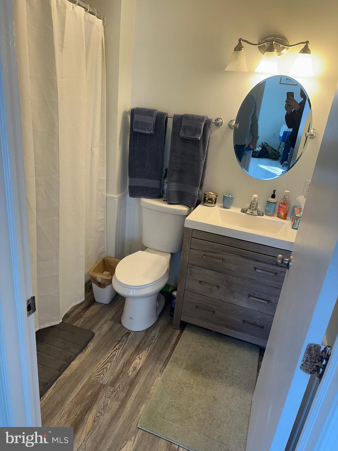 8 Francis Street Wrightstown, NJ 08562 - Photo 11 of 23 a bathroom with a toilet a sink and mirror