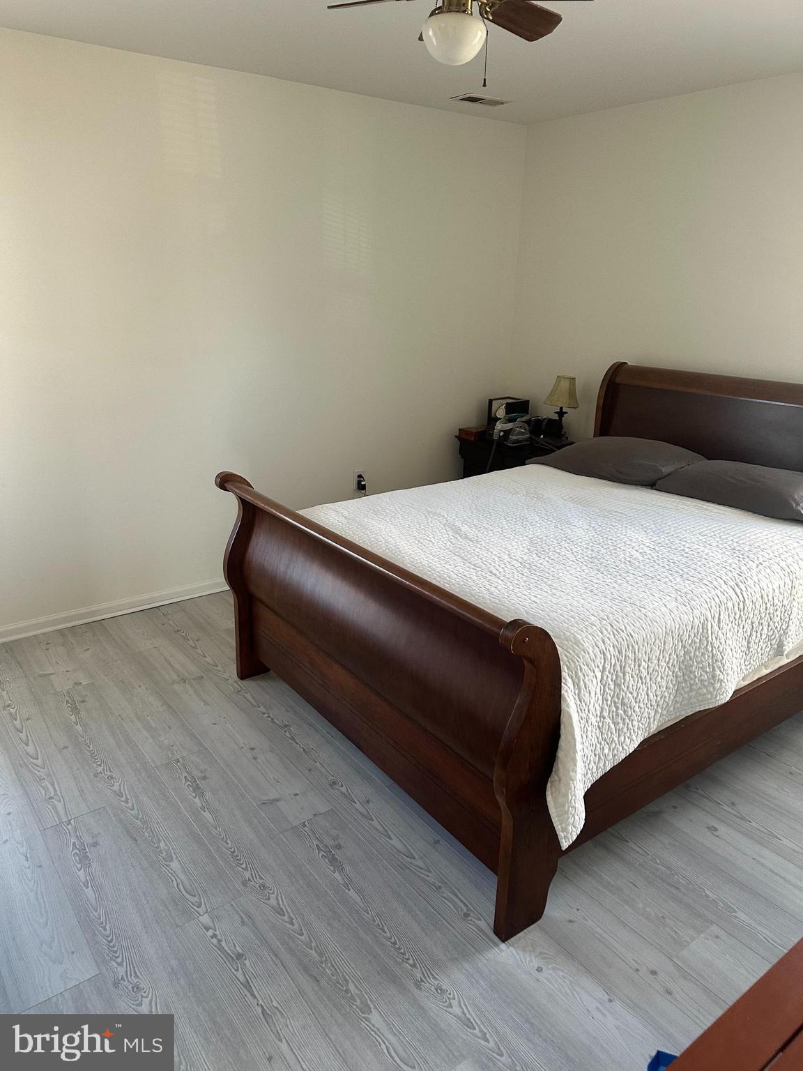 8 Francis Street Wrightstown, NJ 08562 - Photo 13 of 23 a bedroom with a bed and a night stand