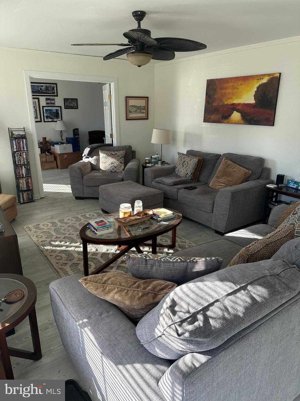 8 Francis Street Wrightstown, NJ 08562 - Photo 6 of 23 a living room with furniture a rug and a chandelier
