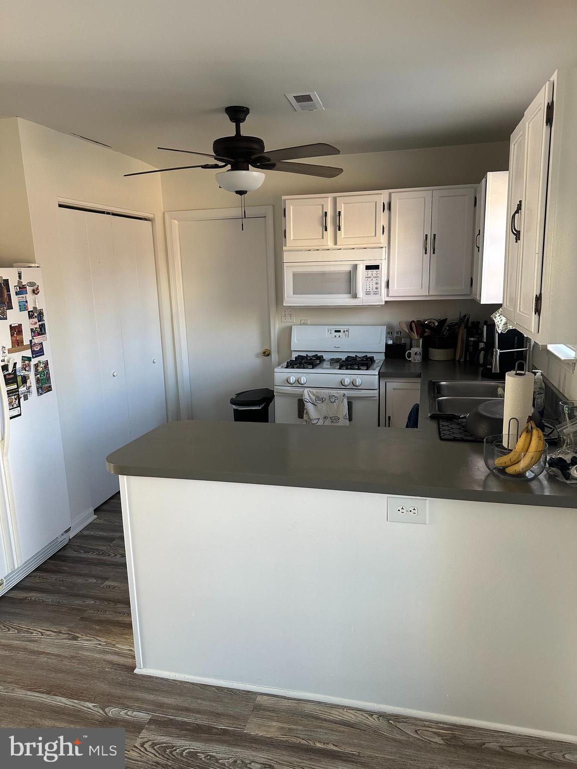 8 Francis Street Wrightstown, NJ 08562 - Photo 9 of 23 a living room with stainless steel appliances kitchen island granite countertop furniture a refrigerator a sink and a counter top