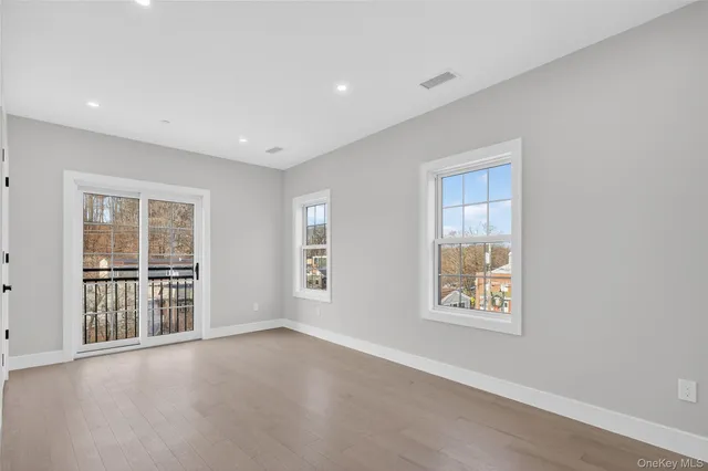 an empty room with windows