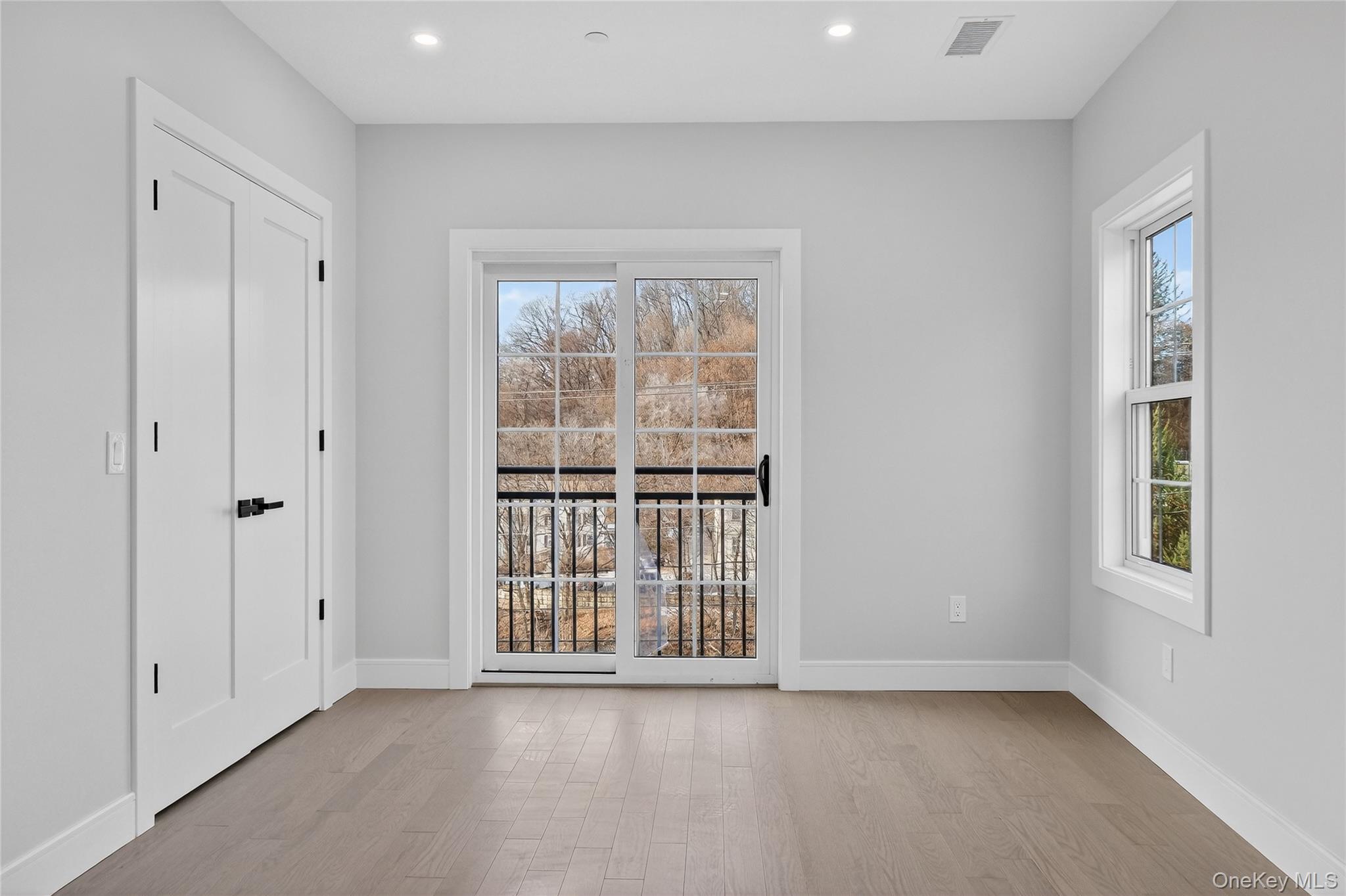 10 Market Street, Unit H Wappingers Falls, NY 12590 - Photo 17 of 24 a view of an empty room with a window