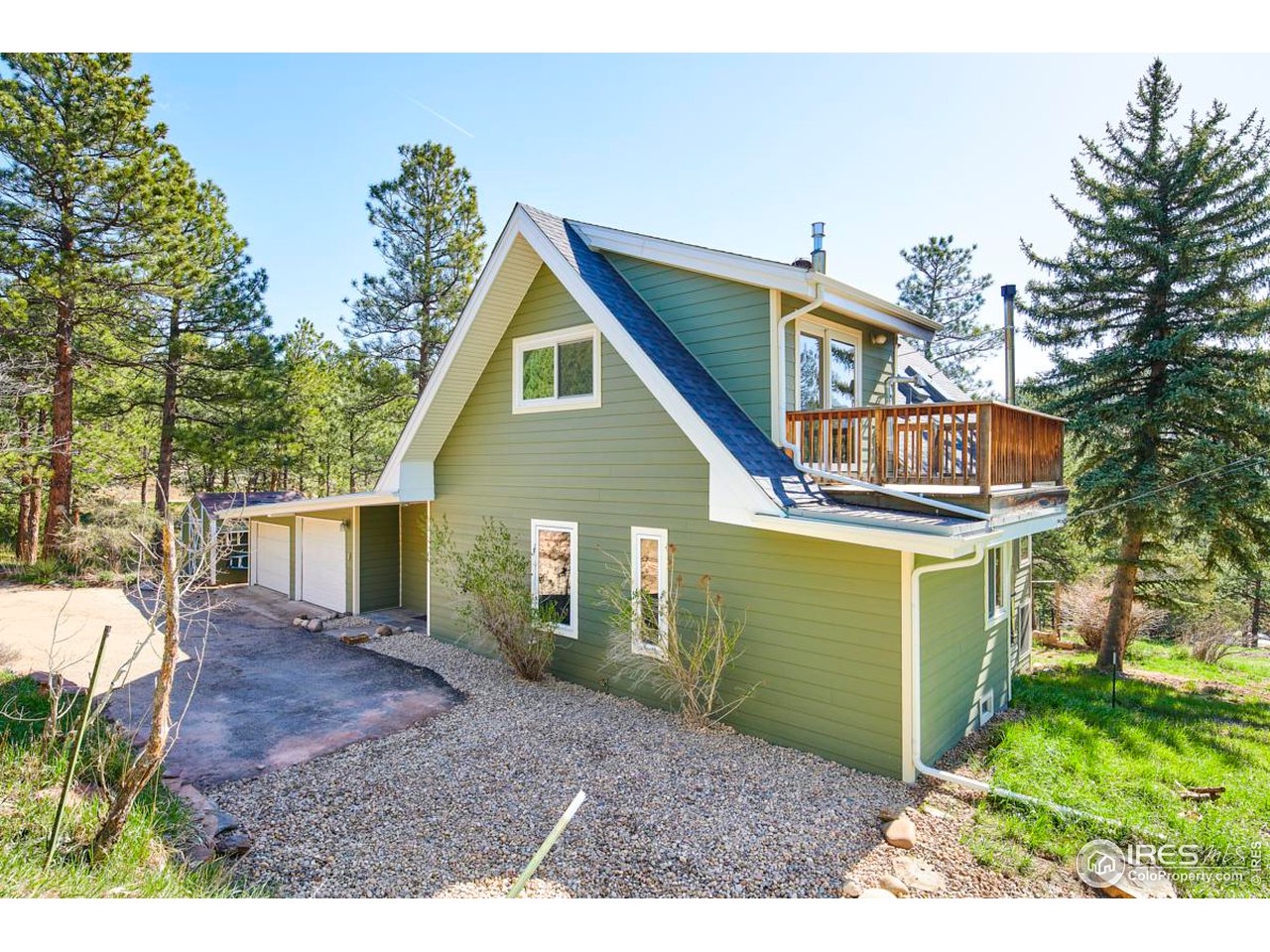347 Kelly Road East Boulder, CO 80302 - Photo 2 of 30 a view of a house with a yard