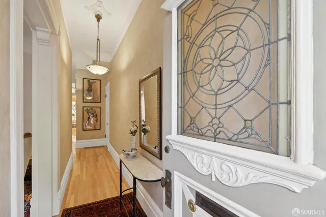 a bathroom with a sink a mirror and a shower