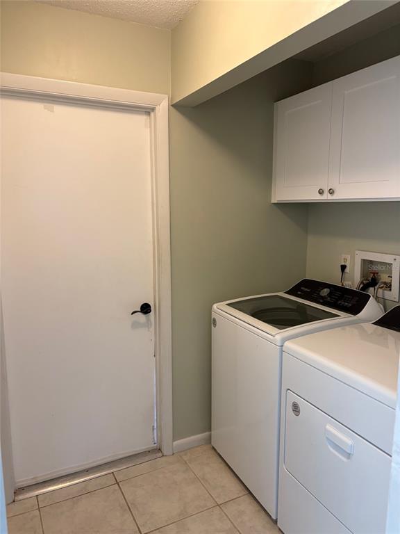 21425 Southwest Plantation Street Dunnellon, FL 34431 - Photo 17 of 54 a utility room with dryer and washer