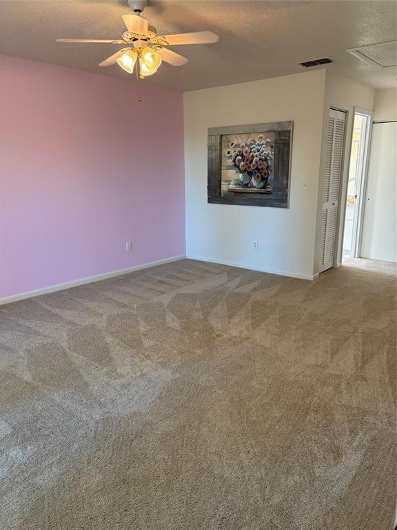21425 Southwest Plantation Street Dunnellon, FL 34431 - Photo 21 of 54 a view of a livingroom with a chandelier fan