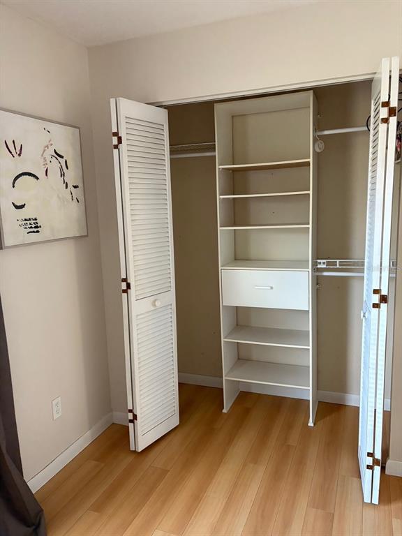21425 Southwest Plantation Street Dunnellon, FL 34431 - Photo 33 of 54 a view of walk in closet with empty racks