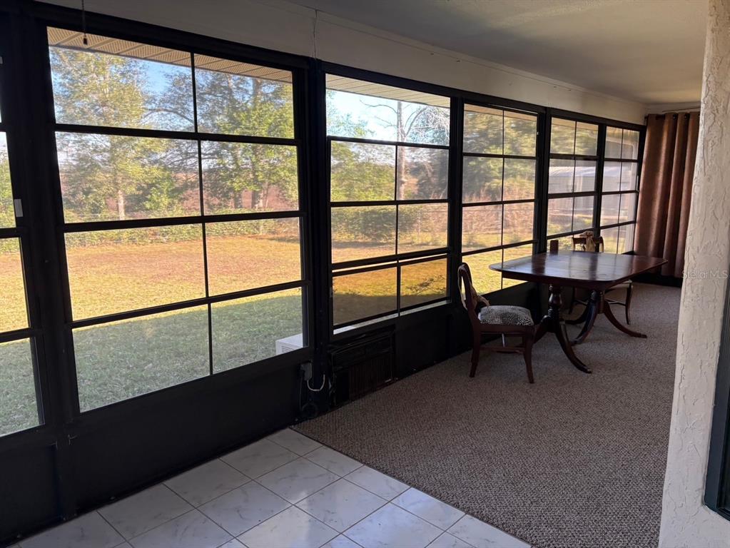21425 Southwest Plantation Street Dunnellon, FL 34431 - Photo 45 of 54 a view of a room with a large window