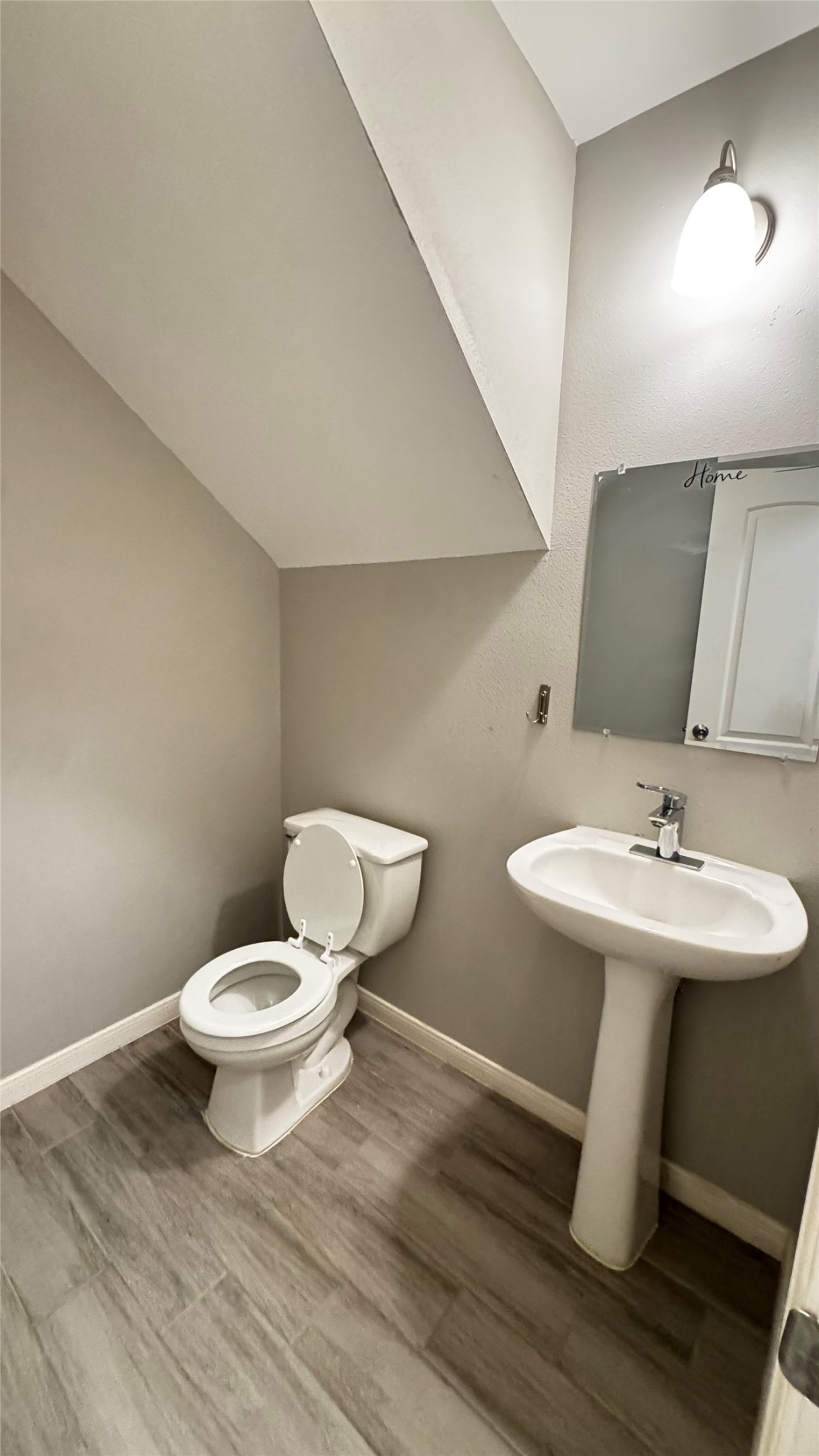 6614 Bluestone Springs Lane Spring, TX 77379 - Photo 13 of 21 a bathroom with a toilet a sink and mirror