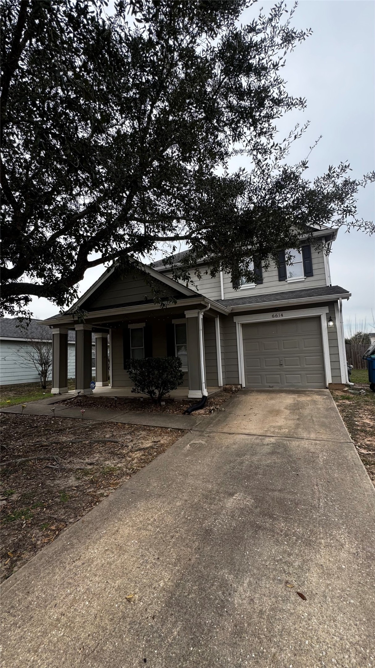 6614 Bluestone Springs Lane Spring, TX 77379 - Photo 2 of 21 a front view of a house with a garden