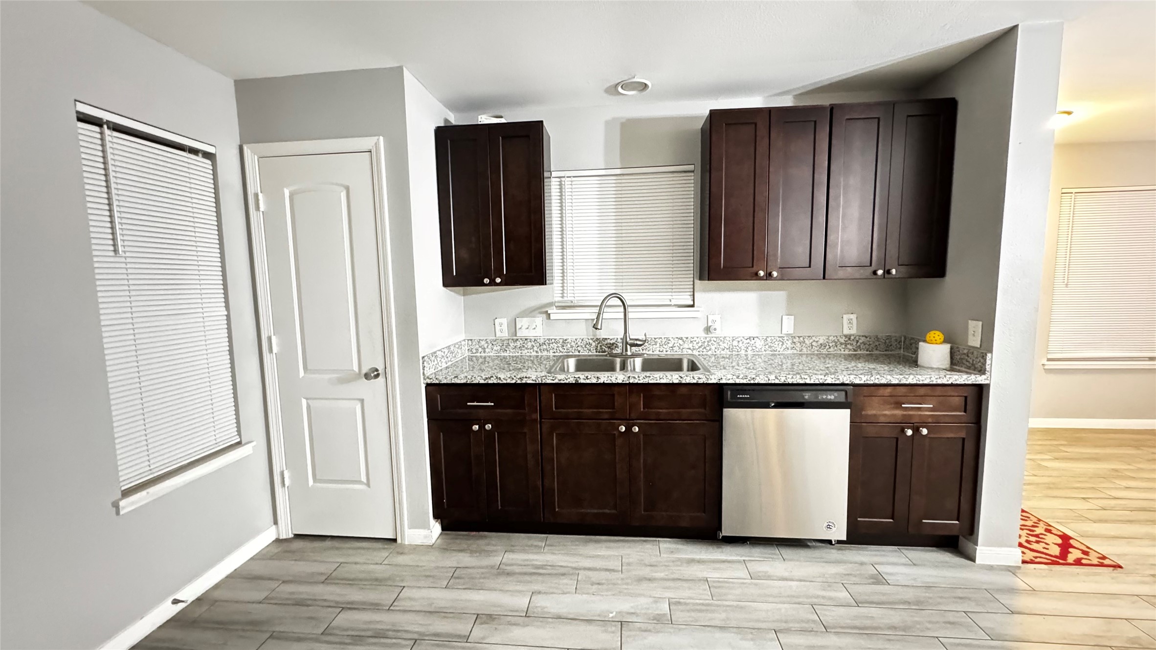 6614 Bluestone Springs Lane Spring, TX 77379 - Photo 7 of 21 a bathroom with a granite countertop sink and a mirror
