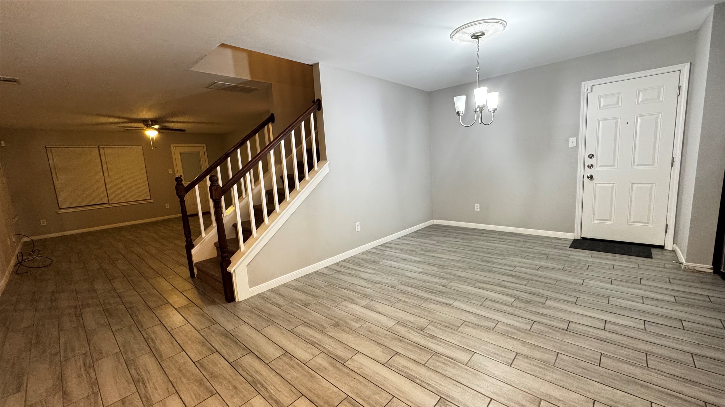 6614 Bluestone Springs Lane Spring, TX 77379 - Photo 9 of 21 a view of an entryway with wooden floor