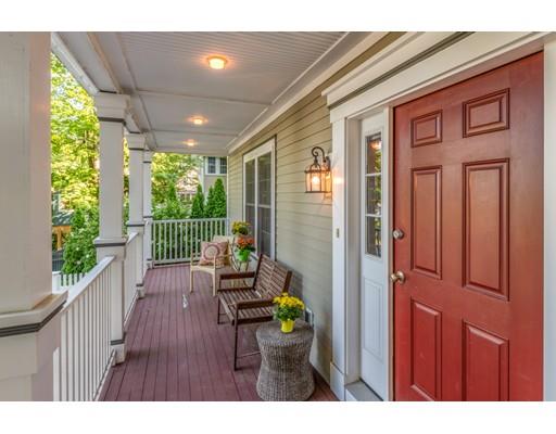 2 Farmer Road Arlington, MA 02476 - Photo 2 of 26 a balcony with furniture and garden
