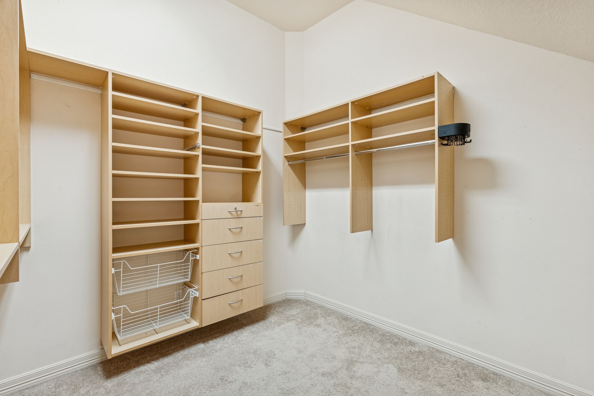 2202 Britton Ridge Drive Katy, TX 77494 - Photo 16 of 41 With two separate "his & her" closets, everyone has room to get ready! These primary closets holds exceptional space to store all your clothes, shoes and private belongings to keep everything organized with style.