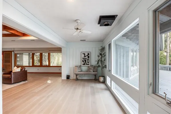 a bed room with a bed and a chandelier