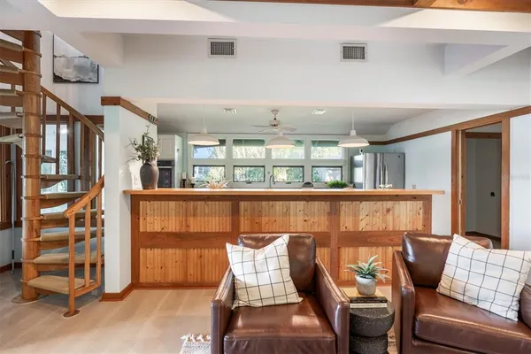 a living room with furniture and a window