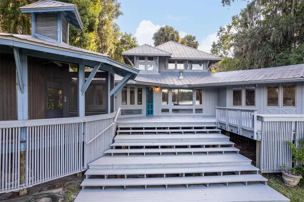 a view of house with outdoor space