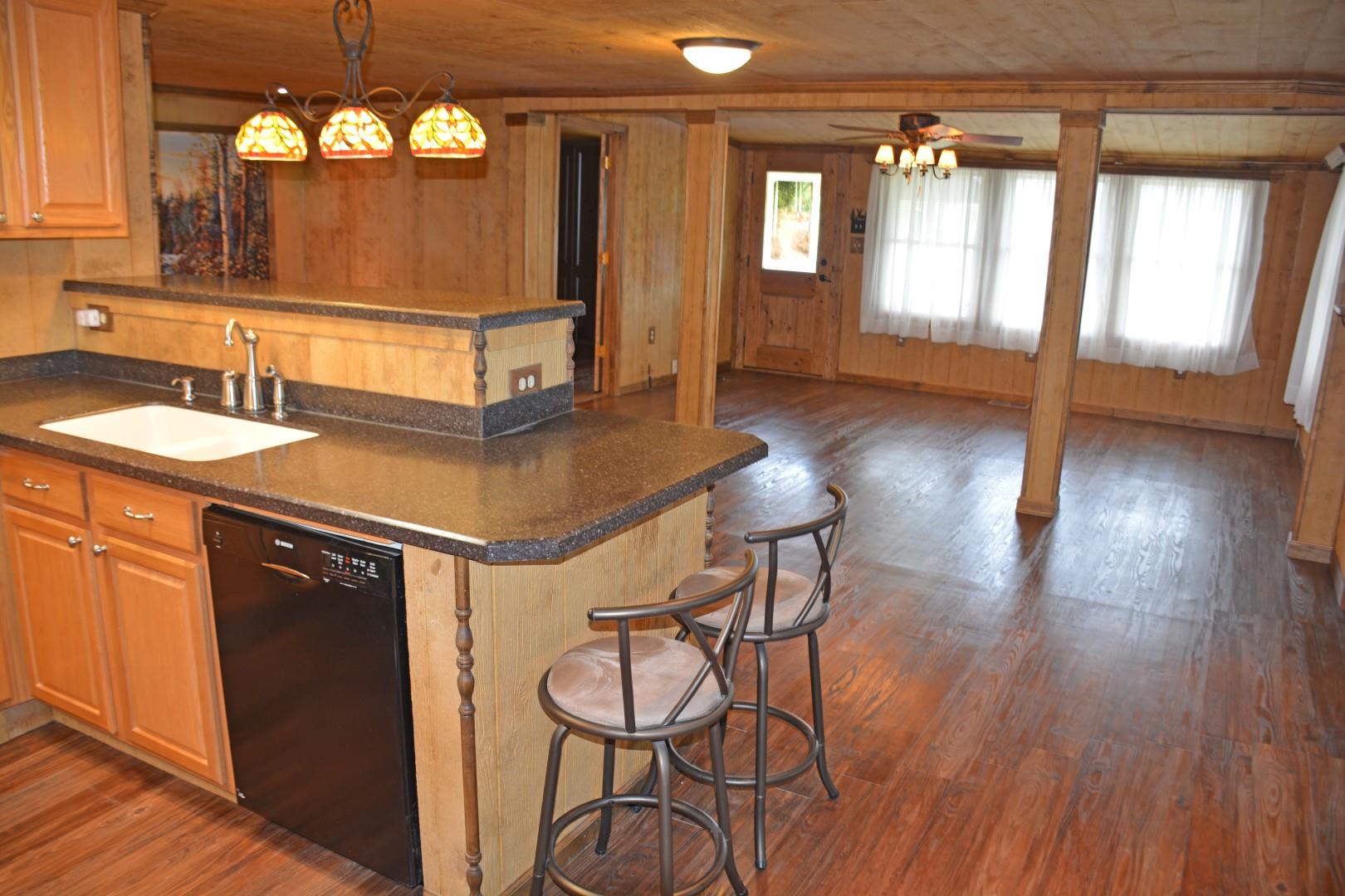1086 Westfield Road Dickson, TN 37055 - Photo 5 of 30 Looking through the kitchen into the den / living room.