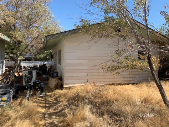 1302 South Mahan Street Ridgecrest, CA 93555 - Photo 14 of 17 a view of back yard of the house