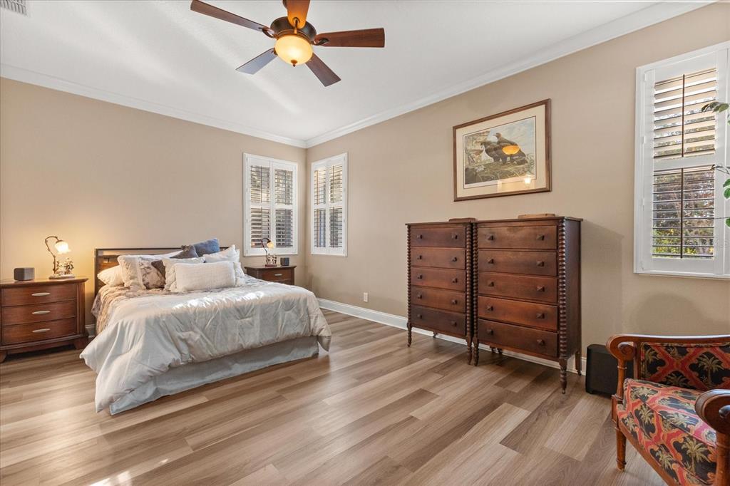 504 Garden Club Drive Deland, FL 32724 - Photo 15 of 35 a bedroom with a bed and a dresser