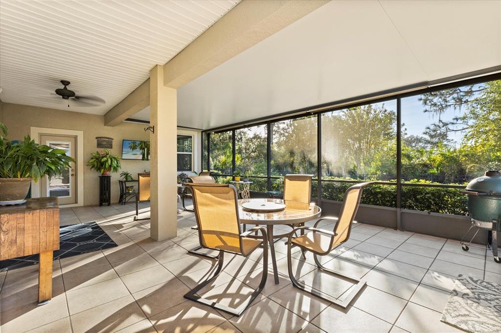 504 Garden Club Drive Deland, FL 32724 - Photo 2 of 35 a dining room with furniture and wooden floor