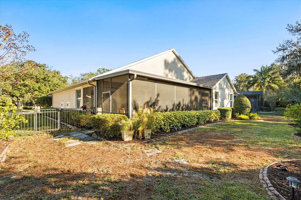 504 Garden Club Drive Deland, FL 32724 - Photo 27 of 35 a front view of a house with a yard