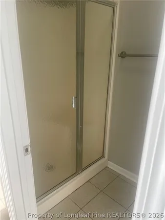 a bath tub sitting next to a window