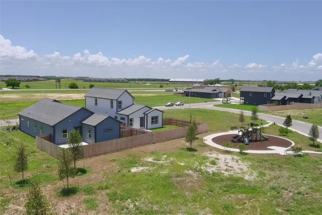 a view of a city with lawn chairs