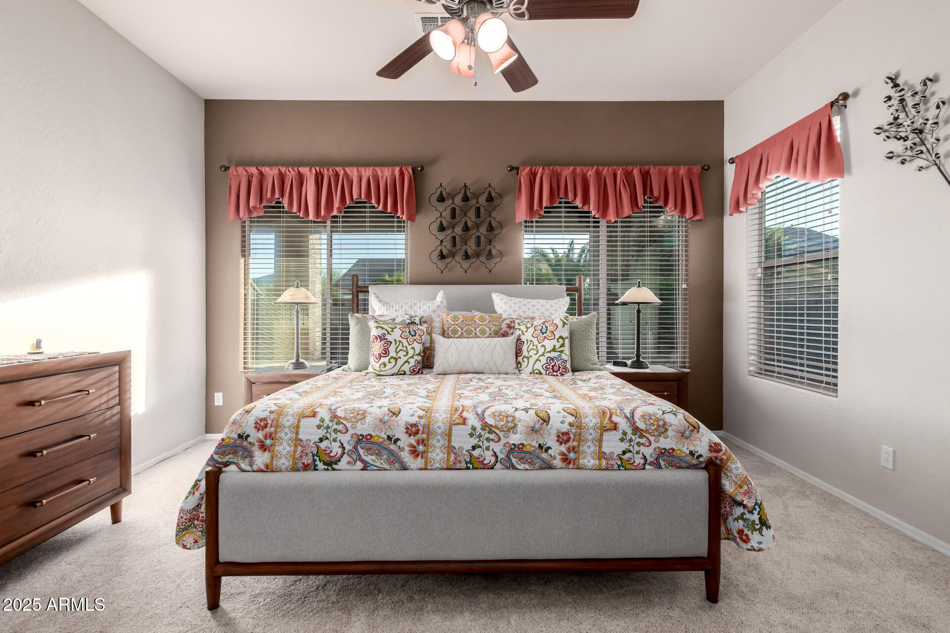 18115 West Desert View Lane Goodyear, AZ 85338 - Photo 18 of 57 a bedroom with a bed and window