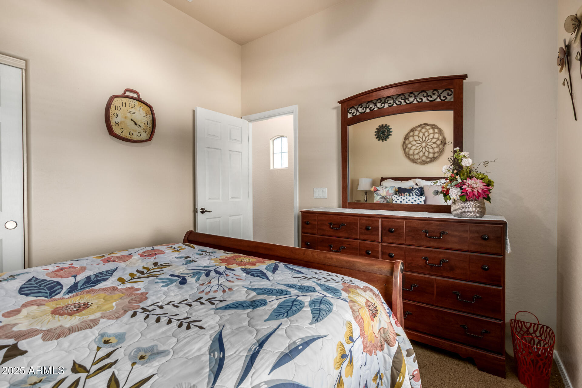 18115 West Desert View Lane Goodyear, AZ 85338 - Photo 26 of 57 a bedroom with a bed and cabinets