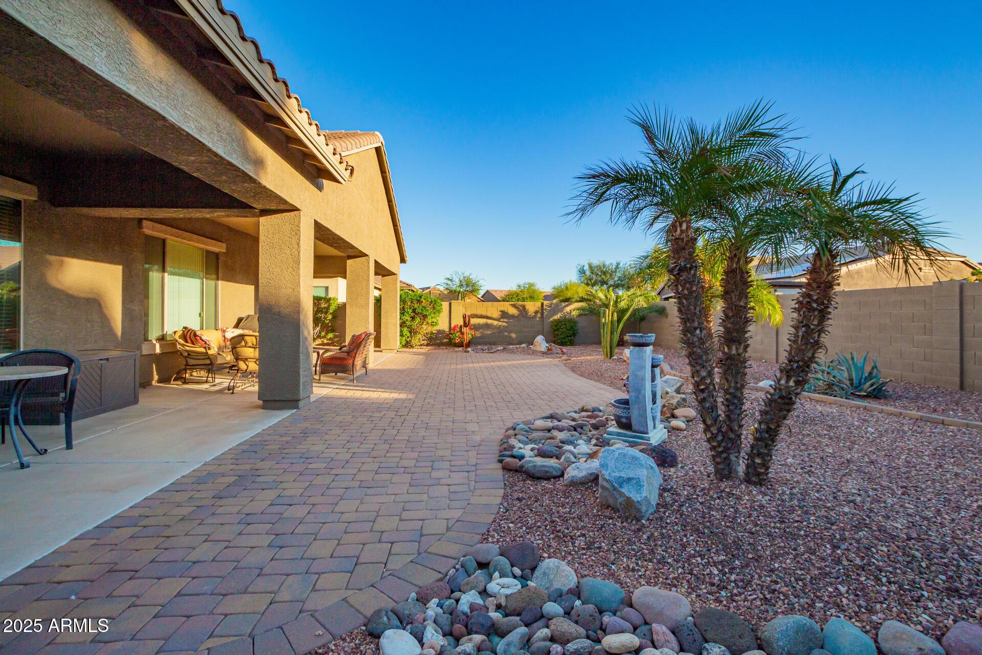 18115 West Desert View Lane Goodyear, AZ 85338 - Photo 33 of 57 a view of a backyard with swimming pool