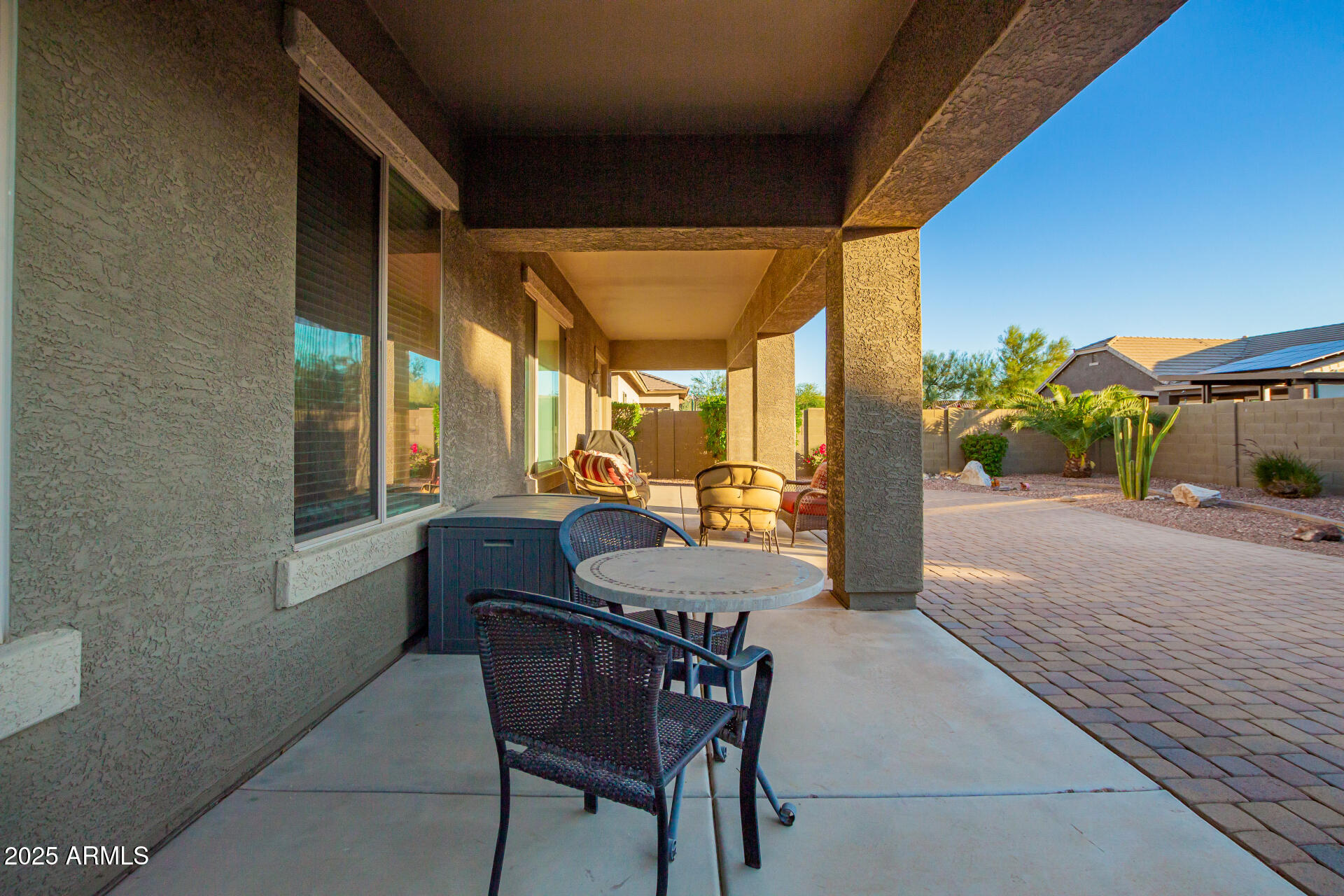 18115 West Desert View Lane Goodyear, AZ 85338 - Photo 34 of 57 a balcony with furniture and a potted plant