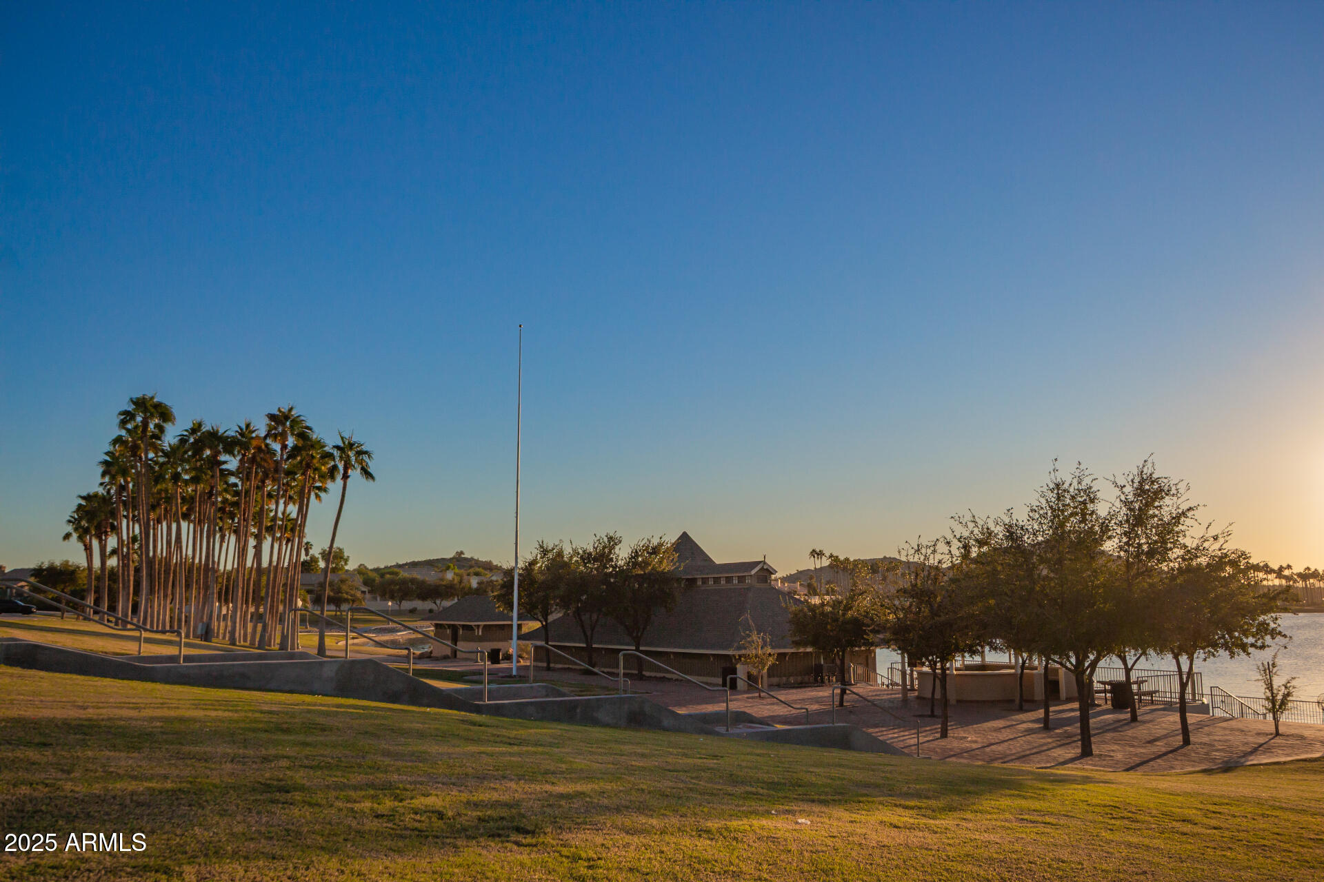 18115 West Desert View Lane Goodyear, AZ 85338 - Photo 42 of 57 a view of a lake with houses
