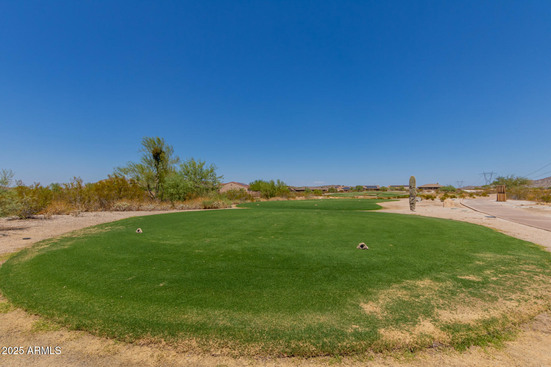 18115 West Desert View Lane Goodyear, AZ 85338 - Photo 49 of 57 a view of a field with an ocean