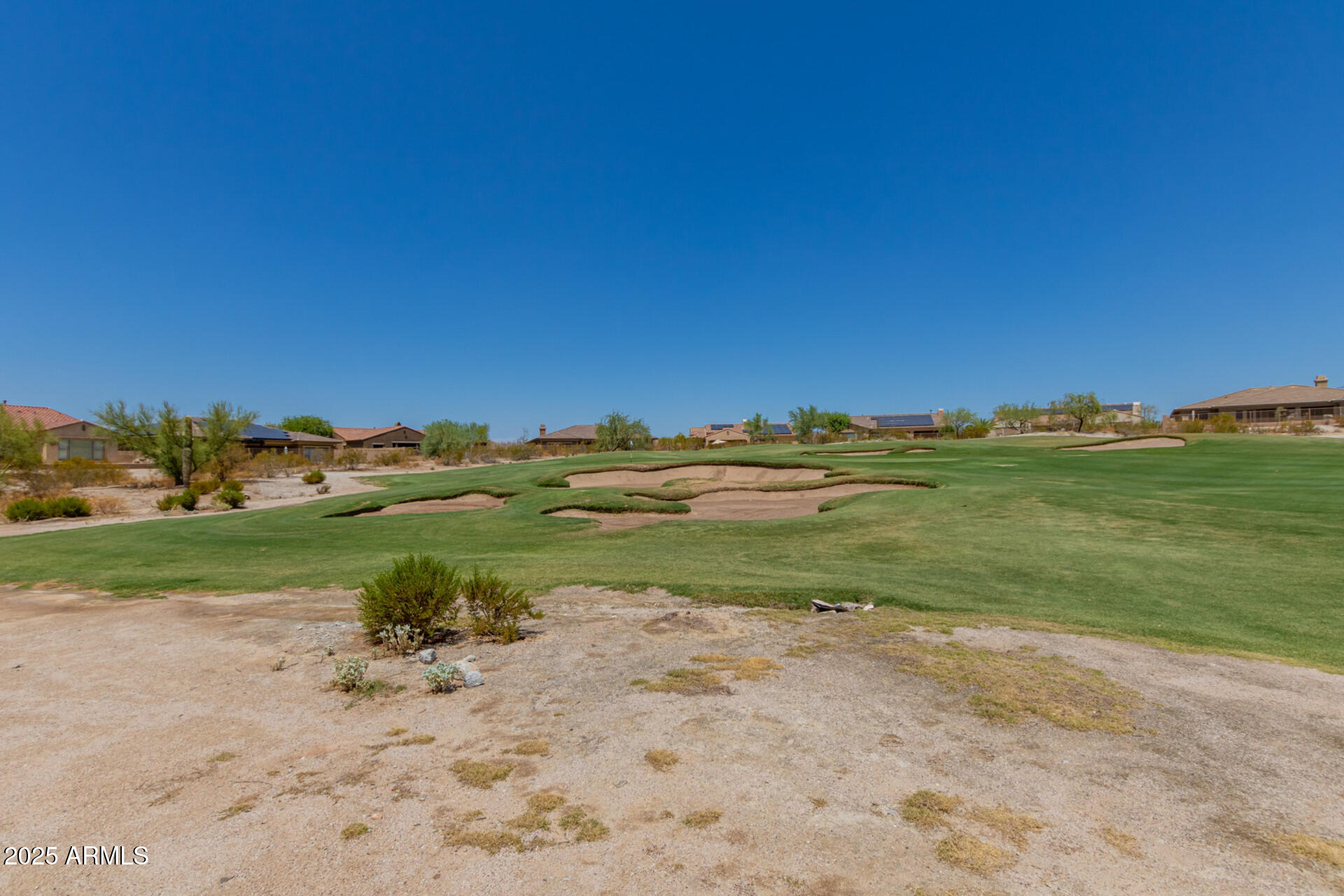 18115 West Desert View Lane Goodyear, AZ 85338 - Photo 51 of 57 a view of a lake with beach