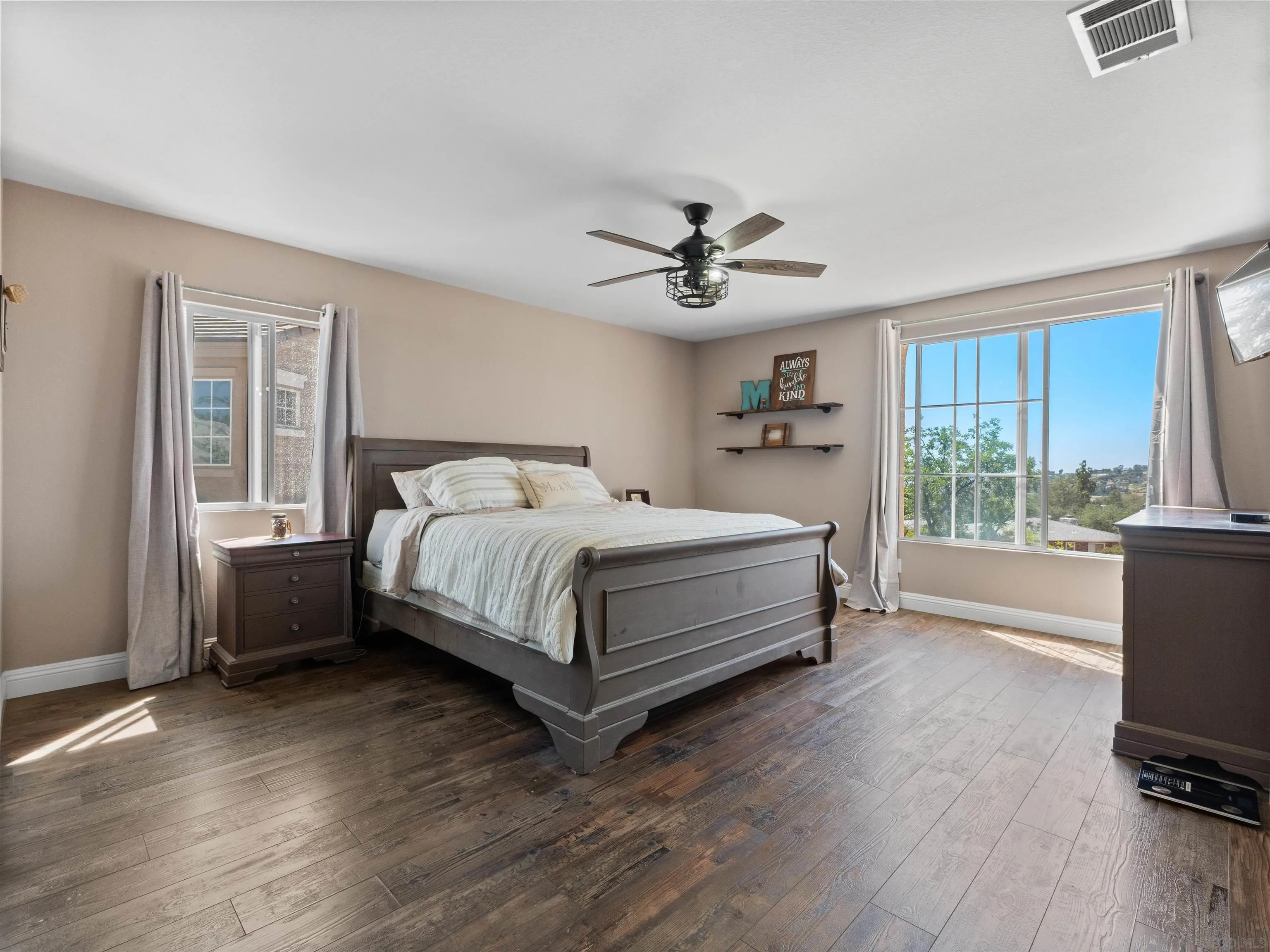 2925 Sunhaven Court Alpine, CA 91901 - Photo 10 of 19 a bedroom with a bed and a large window