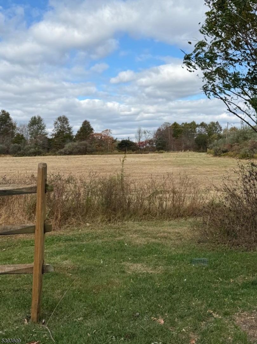 550 Barbertown Point Breeze Road Flemington, NJ 08822 - Photo 5 of 10 a view of a lake from a yard
