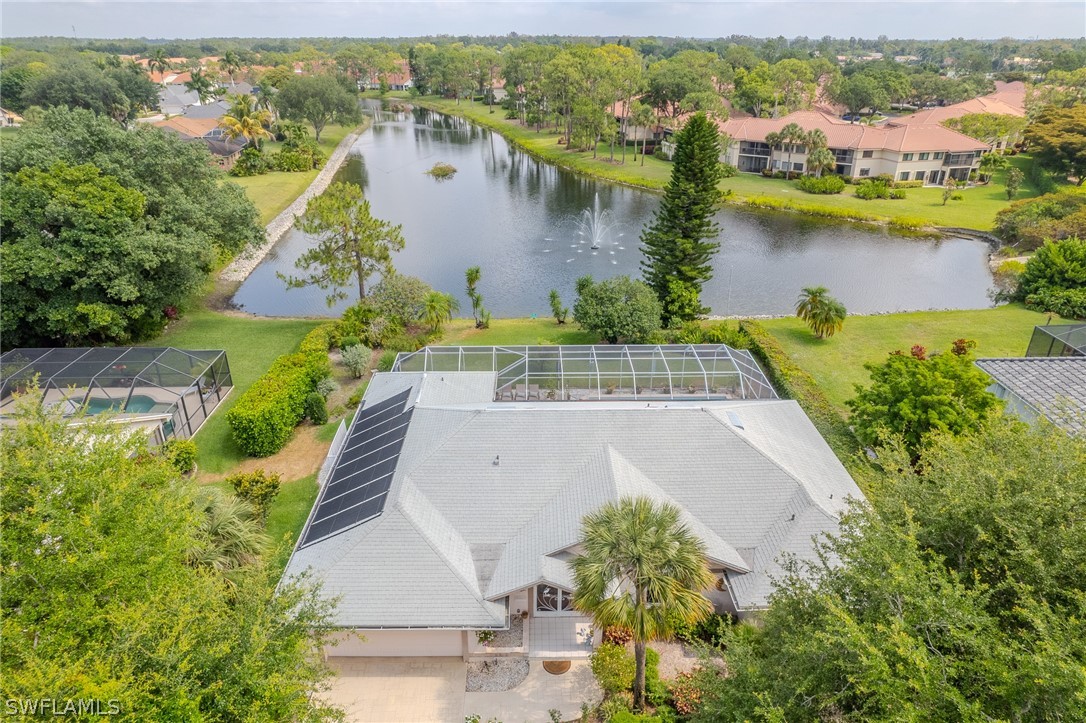 7181 Appleby Drive Naples, FL 34104 - Photo 4 of 29 an aerial view of a house with a lake view