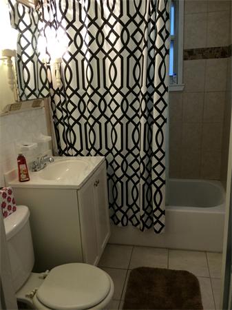 3 Prescott Street Boston, MA 02128 - Photo 8 of 8 a bathroom with a sink toilet and bathtub