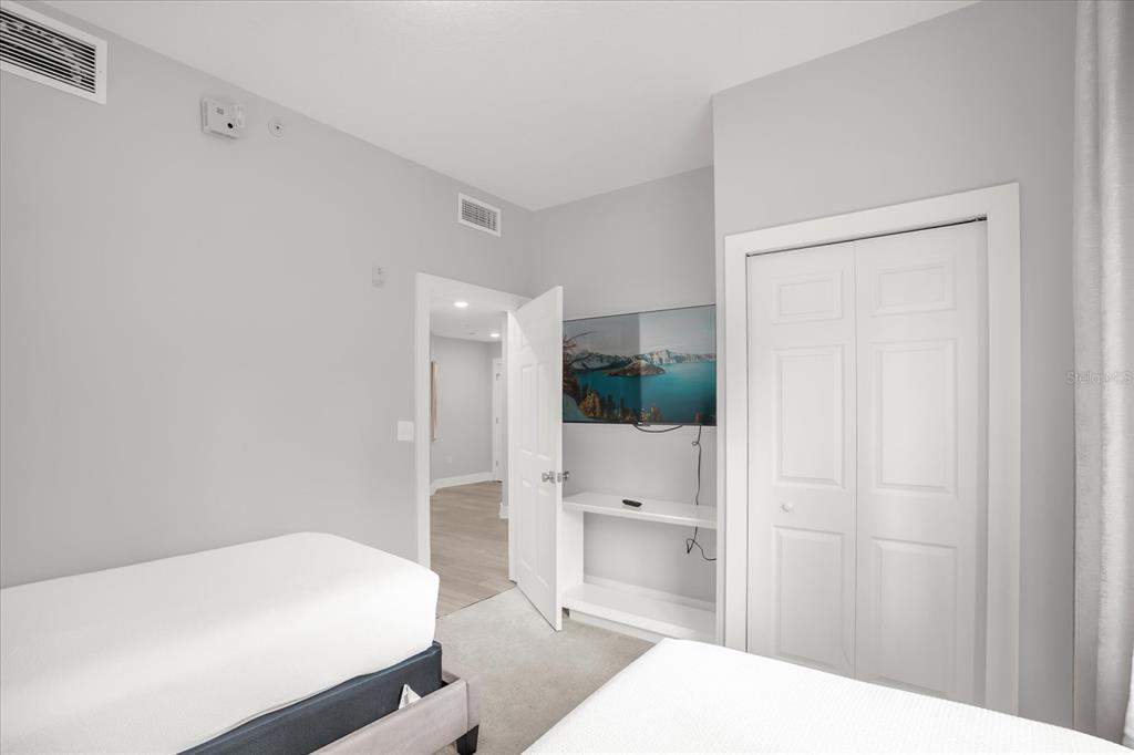 8774 Worldquest Boulevard Orlando, FL 32821 - Photo 19 of 35 a bathroom with a sink and a shower